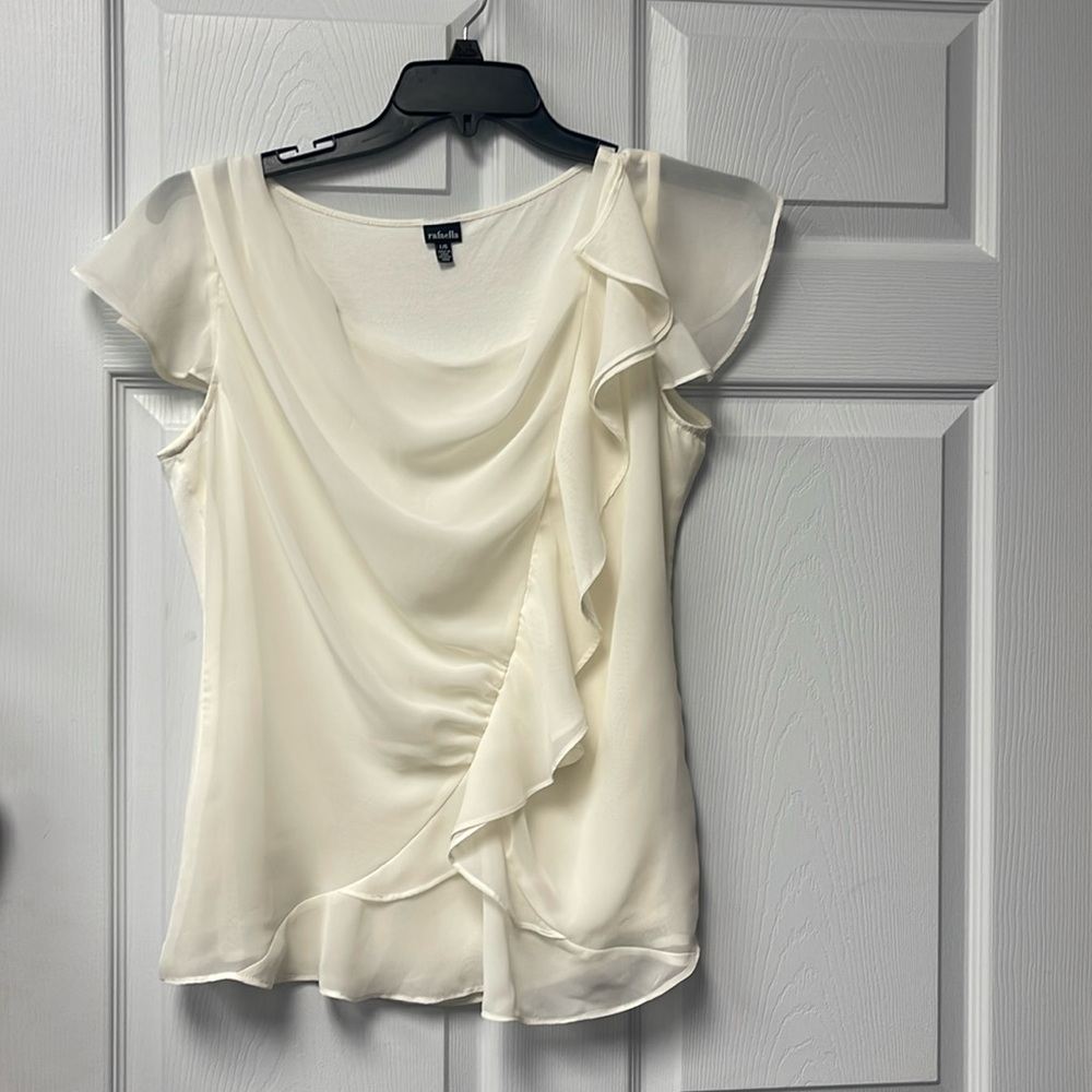 Rafaella sleeveless ruffled blouse.